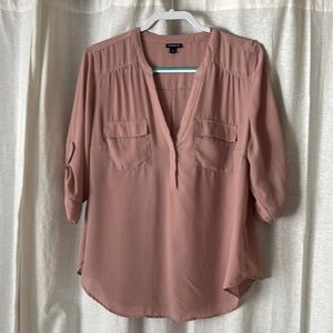 Three quarter length torrid blouse.